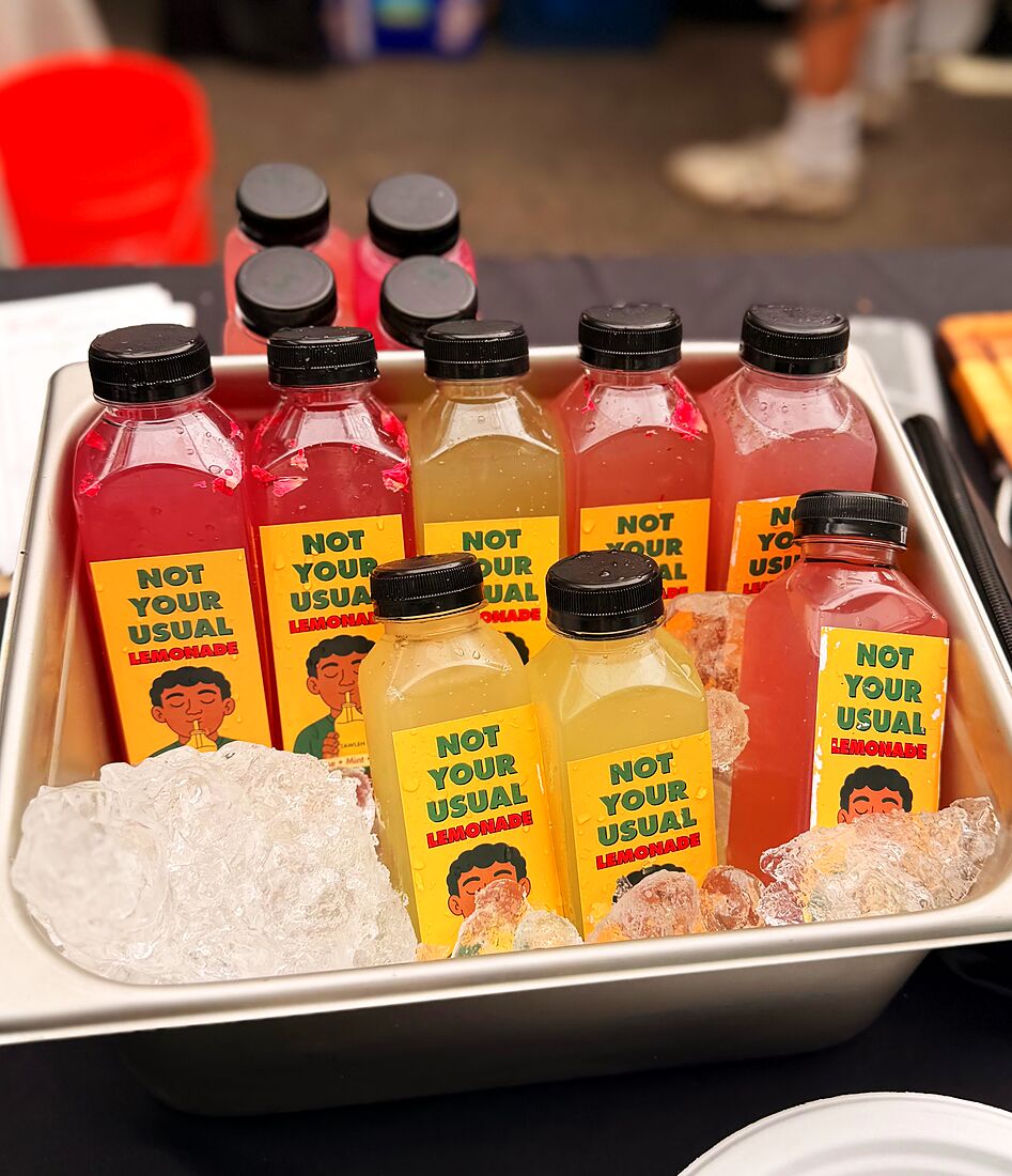 Bottles of Tawleh lemonade on ice